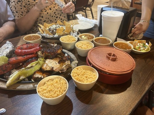 Parrillada and loaded baked potato