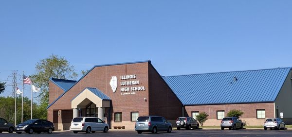 School entrance behind church