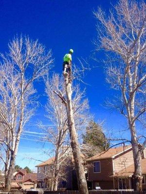 A climber up high in Franktown, Colorado.