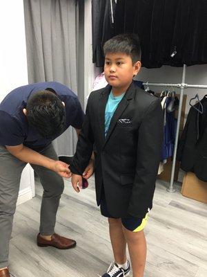 Getting a suit for the son .  In store tailors make it so easy!