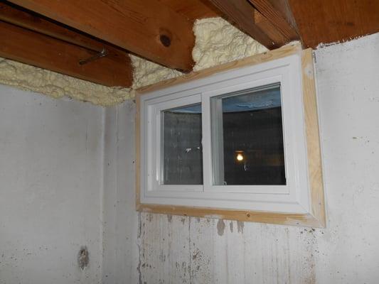 Replacement EnergyStar rated basement window and spray foam sealed and insulated  basement rim joist.