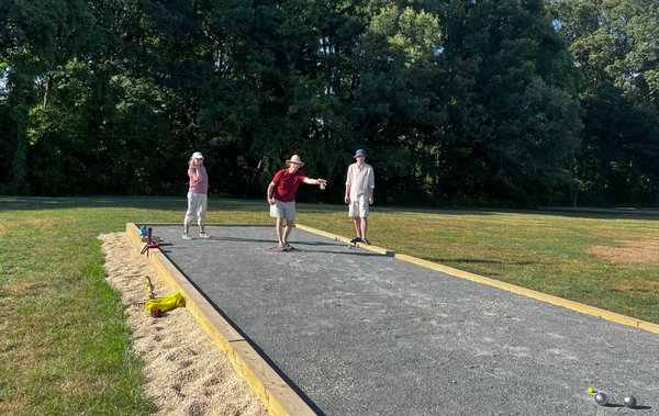 Player tossing a boule