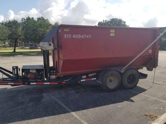 20 yard dumpster, tarped and ready for the dump.