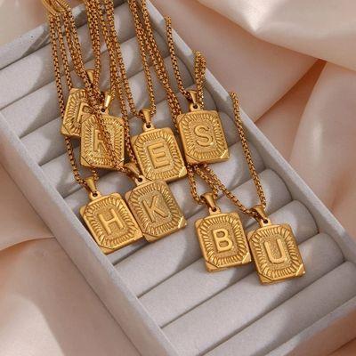 Retro-initial letter necklace.