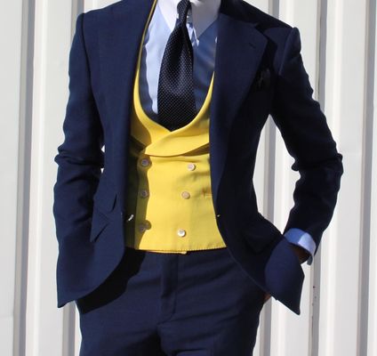 Navy suit with yellow double breasted contrast vest