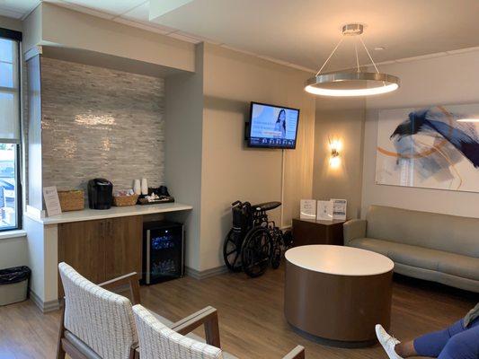 Patient reception area with the TV snacks and coffee