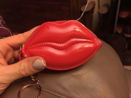 $7 for the WIN! Haha It can hold cards,keys,money,lipstick.5inches long/3inches wide.