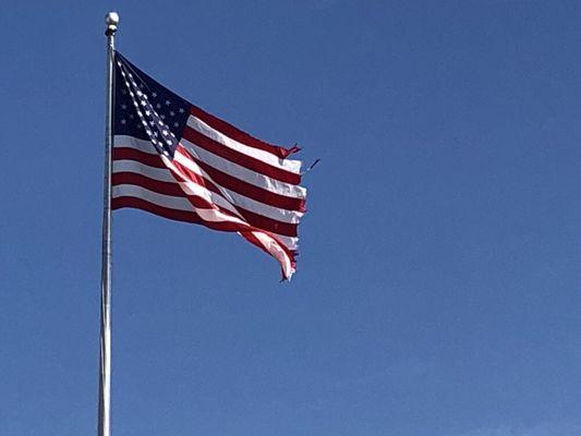 Tattered and torn American Flag at Walmart. What an insult!