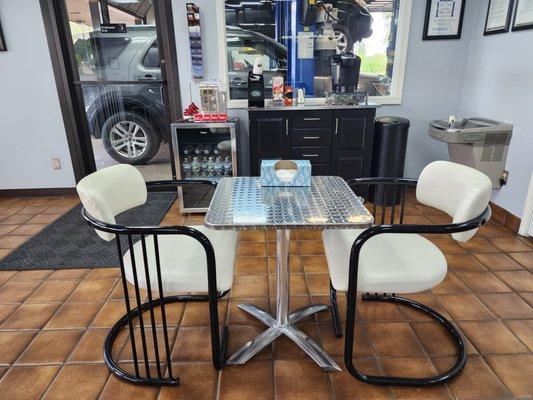 Coffee area and view into west shop.