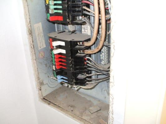 Hidden Electrical Problem in the main service panel. Two circuits sharing the same breaker. Identified during the Home inspection.