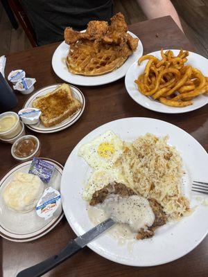 Belgium Waffle with Chicken Fingers, Country Fried Steak and Eggs, French Toast, Curly Fries, Biscuit