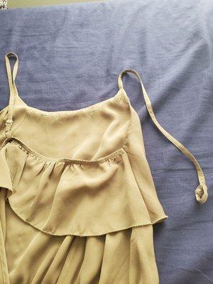 Blouse strap torn off after wash and fold service