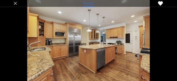 Our kitchen before (looks good in photos but many cabinets were broken, cracked, or unusable)