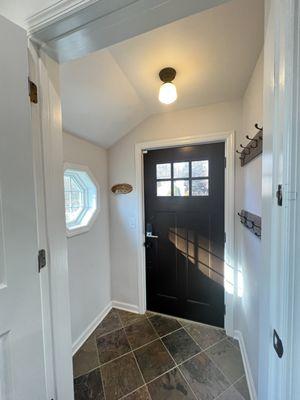 Door installed and mudroom painted