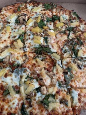 Pineapple, mushroom, and spinach flatbread pizza