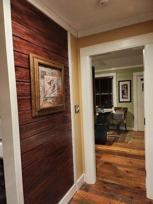 View from The Cottage bedroom towards living room, kitchen & front door