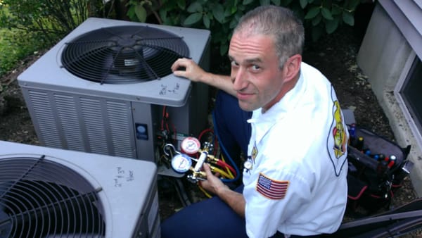 Tony our Lead service tech checking for proper refrigerant pressures.