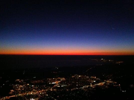 Sunset over the Monterey Peninsula capture during an evening training flight.