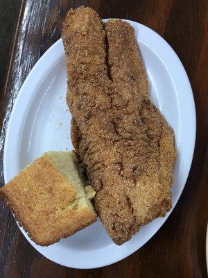 Hubs second piece of catfish and his chunk of cornbread.