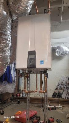 A tanked to tankless swap out in a basement