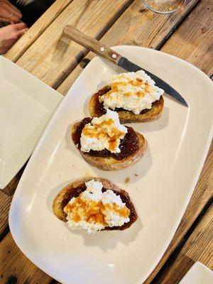 Crostini with fig jam, ricotta and hot honey