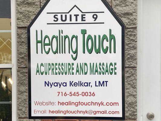 Business name at the entrance for HealingTouch