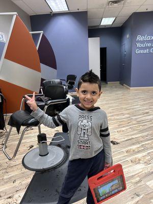 A very happy 6 yr old with his fresh haircut by Tammy