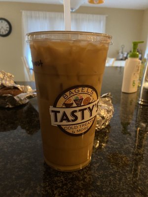 Large iced coffee with coconut flavor shot