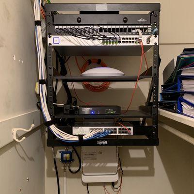 Small wall mount rack in office closet.