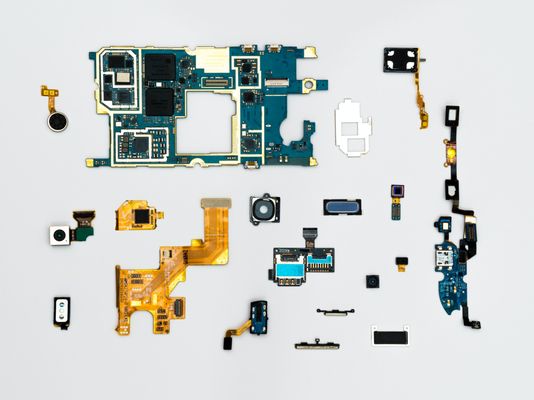 Exploded view of a smartphone during repair.