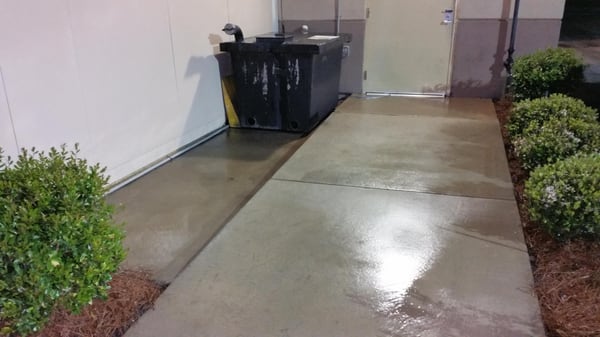 Grease removal from concrete of local restaurant , after rinse