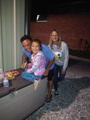 Uncle Toto and Auntie Tracy with Alyssa after judo practice at Servite