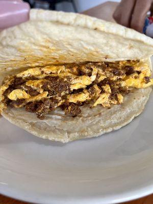 Chorizo taco on homemade corn tortilla