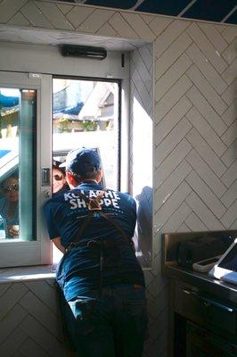 Drive-thru window- serving kolaches and coffee