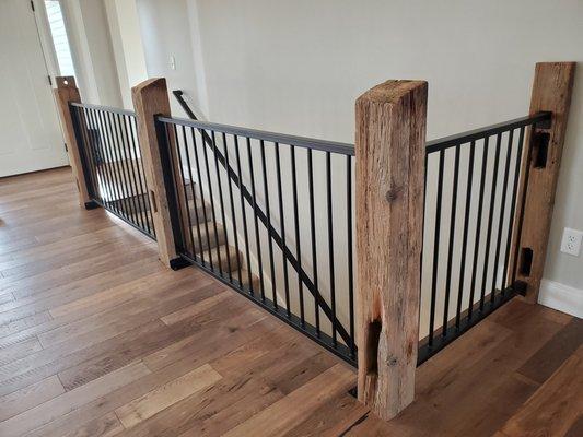 Custom build rustic posts from Carlson's and metal railing by Southwick Designs.