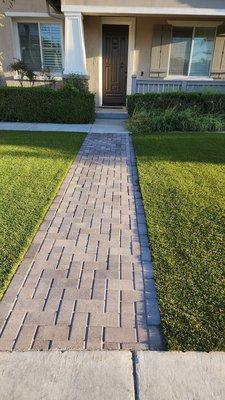 Pavers paired up with synthetic turf