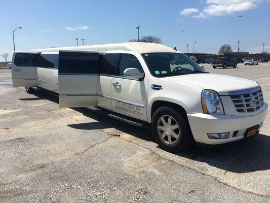 22 passenger Cadillac Escalade raises roof 5th door great for wedding or any accession