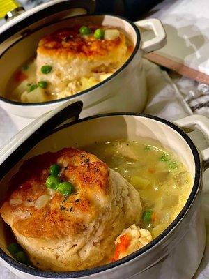 Chicken Pot Pie topped with a fresh biscuit.