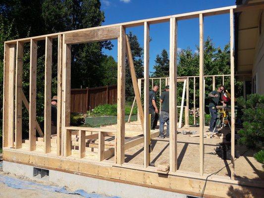 Rough framing an additions outer walls.