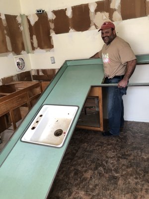 Hubby taking down the old counter tops