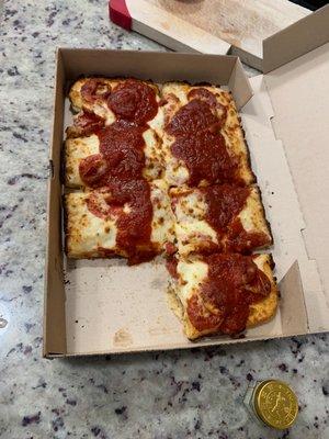 Detroit style pizza with extra pepperoni.  Do you see extra pepperoni? Bad customer service don't order