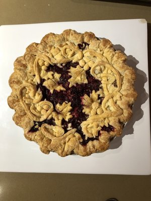 Marionberry pie with decorative topping