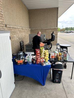 Hot dog stand setup outside the exit doors of Menards