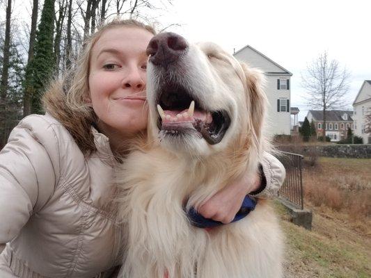 one of our fabulous dog walkers, Lexi, enjoying some quality time with a client's dog