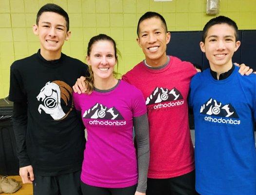 Dr. Eng, his wife Rachel, and two of their boys after running in the Brighton Turkey Trot.