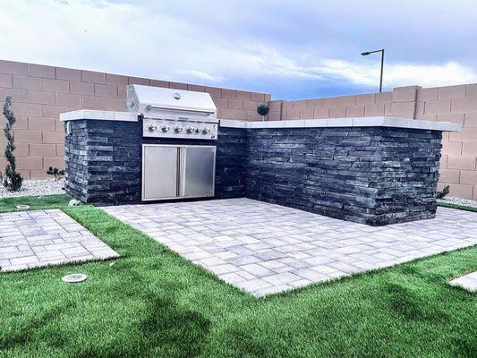 Outdoor kitchen BBQ Grill with stone and travertine