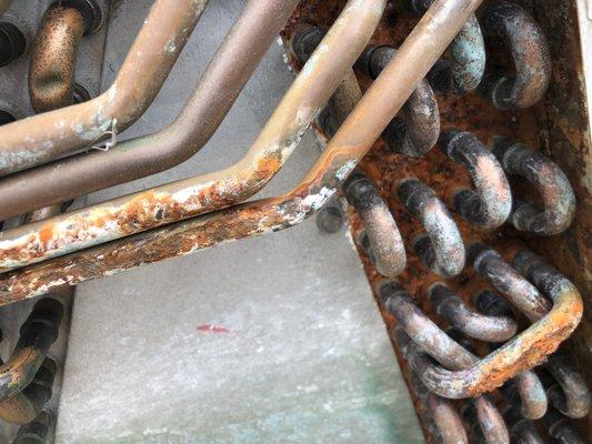 The old coils were severely rusted and corroded. A disaster waiting to happen.