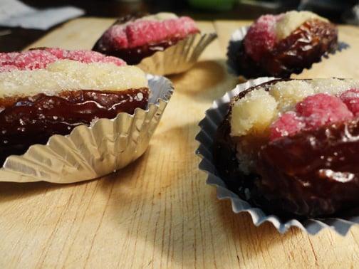 Almond stuffed dates - jumbo Mejdool dates, almonds, sugar, orange blossom water, butter, almond oil, and beet juice for color.