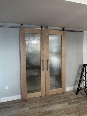 Everything to the left and right of these doors is bolted to drywall at the firm direction of James