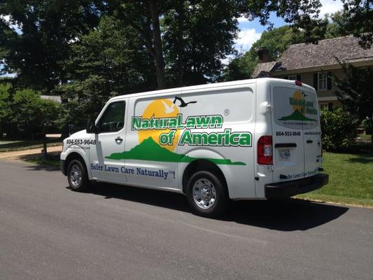 A NaturaLawn of America service van.